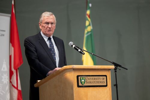 Photo of Robert Richards at a podium delivering a speech